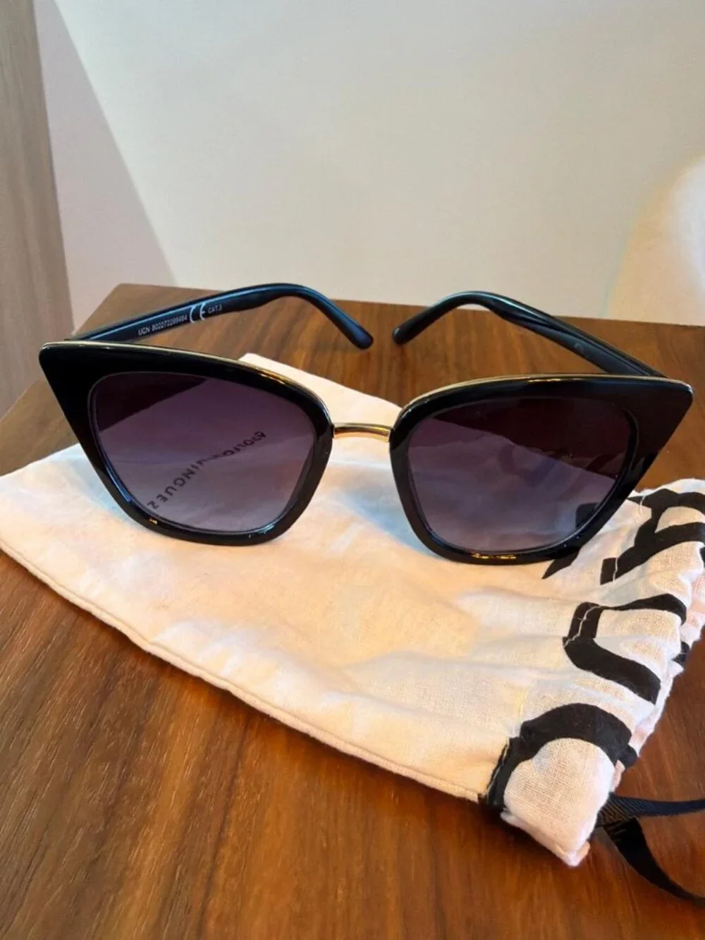 Black Cat-Eye Sunglasses + Alfonso Dominguez Pouch